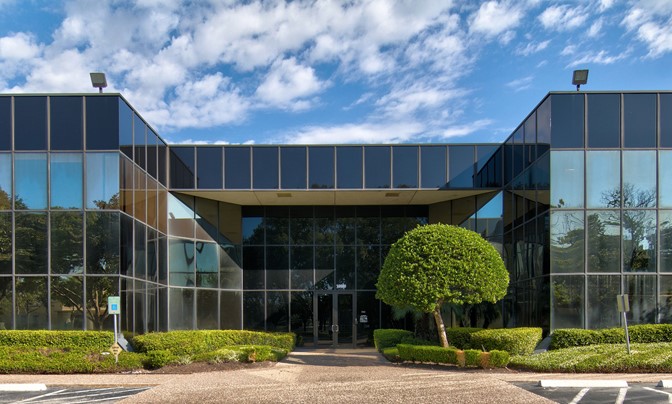 Sold | Westchase District Atrium Style Office Building - #1