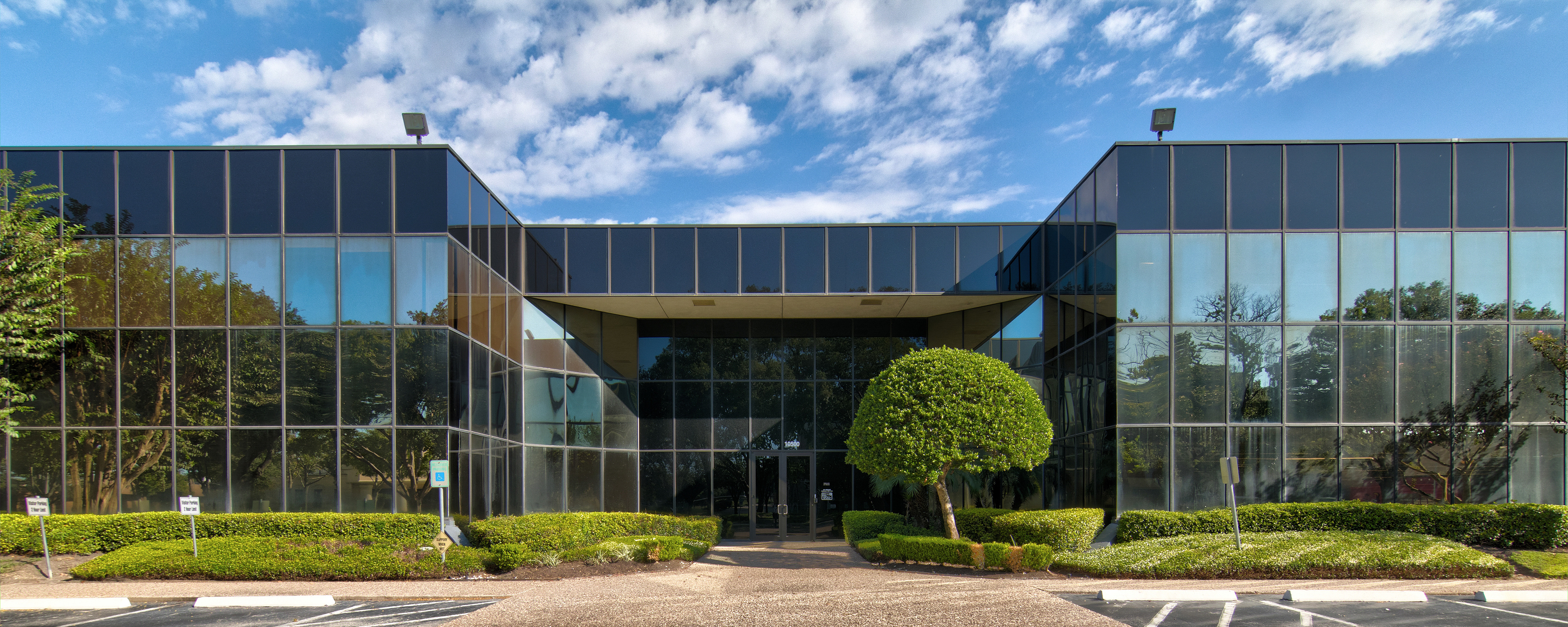 Sold | Westchase District Atrium Style Office Building - #1